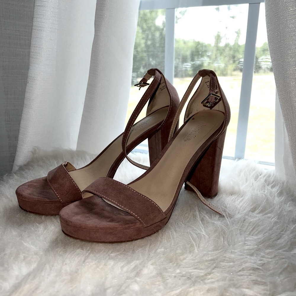 size 7, purplish brown heel